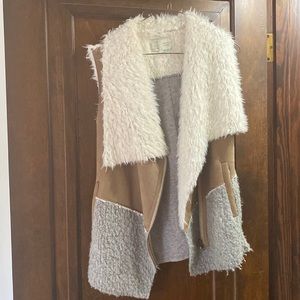 Anthropologie, Monday Tuesday Wednesday brand warm leather and fur vest